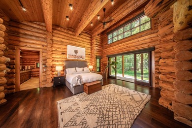 Set on 2.5 acres directly on the Bigwood River within a private - photo 17