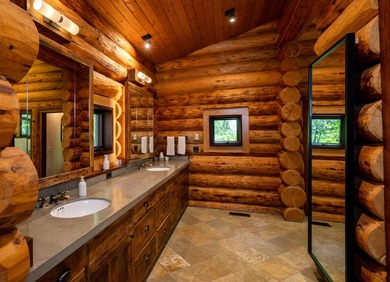 Set on 2.5 acres directly on the Bigwood River within a private - photo 19