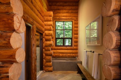 Set on 2.5 acres directly on the Bigwood River within a private - photo 20