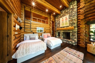 Set on 2.5 acres directly on the Bigwood River within a private - photo 22