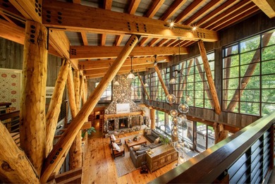 Set on 2.5 acres directly on the Bigwood River within a private - photo 26