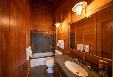 Set on 2.5 acres directly on the Bigwood River within a private - photo 28