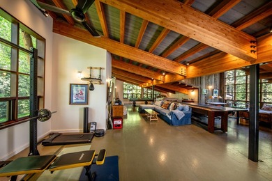 Set on 2.5 acres directly on the Bigwood River within a private - photo 31