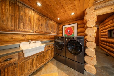 Set on 2.5 acres directly on the Bigwood River within a private - photo 32