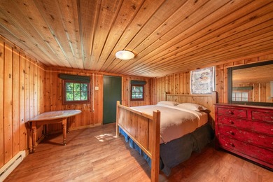 Set on 2.5 acres directly on the Bigwood River within a private - photo 34