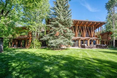 Set on 2.5 acres directly on the Bigwood River within a private - photo 35