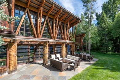 Set on 2.5 acres directly on the Bigwood River within a private - photo 38