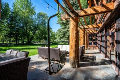 Set on 2.5 acres directly on the Bigwood River within a private - photo 39
