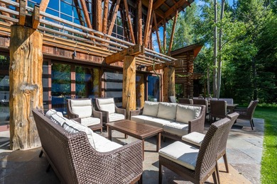 Set on 2.5 acres directly on the Bigwood River within a private - photo 40