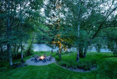 Set on 2.5 acres directly on the Bigwood River within a private - photo 43
