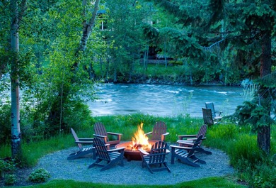 Set on 2.5 acres directly on the Bigwood River within a private - photo 44
