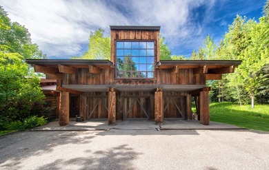 Set on 2.5 acres directly on the Bigwood River within a private - photo 46