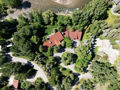 Set on 2.5 acres directly on the Bigwood River within a private - photo 47