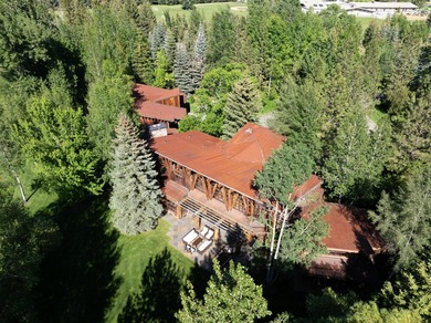 Set on 2.5 acres directly on the Bigwood River within a private - photo 48