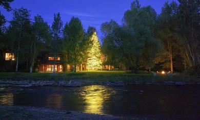 Set on 2.5 acres directly on the Bigwood River within a private - photo 50