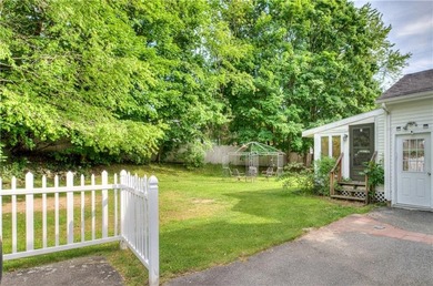 Set back from the road on a spacious 12,888-square-foot lot - photo 31