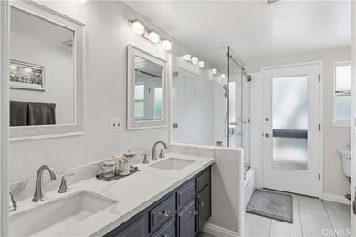 A gated courtyard entry sets the tone for this charming - photo 12
