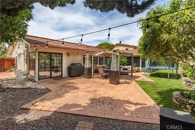A gated courtyard entry sets the tone for this charming - photo 15
