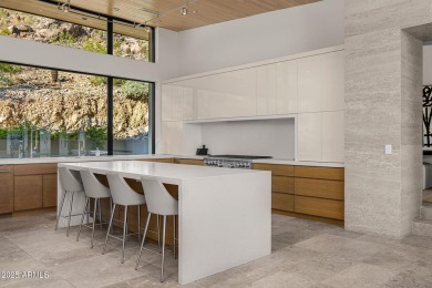 Positioned on a serene hillside Paradise Reserve, this modern