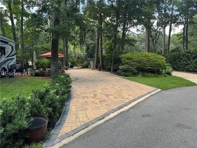This gorgeous RV lot has a paver pad with a hardscape wall and - photo 1