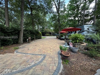 This gorgeous RV lot has a paver pad with a hardscape wall and - photo 4