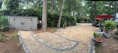 This gorgeous RV lot has a paver pad with a hardscape wall and - photo 8