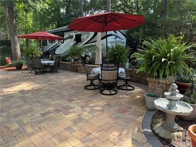 This gorgeous RV lot has a paver pad with a hardscape wall and - photo 9
