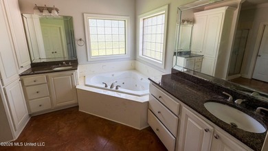 Nestled on approximately 2 acres in the desirable gated - photo 12