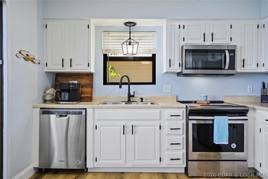 Enjoy unbeatable lake views from this beautifully updated - photo 17