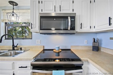 Enjoy unbeatable lake views from this beautifully updated - photo 19