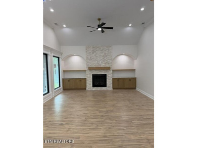Welcome to this stunning custom-built home where timeless stone - photo 3