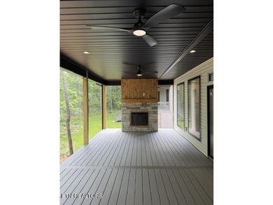 Welcome to this stunning custom-built home where timeless stone - photo 4
