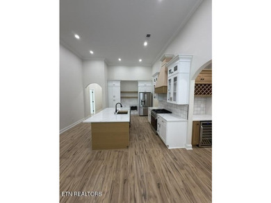 Welcome to this stunning custom-built home where timeless stone - photo 5