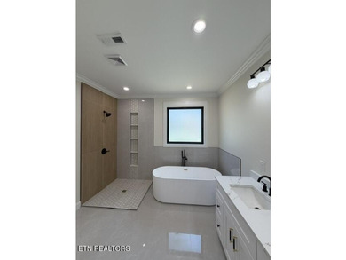 Welcome to this stunning custom-built home where timeless stone - photo 6