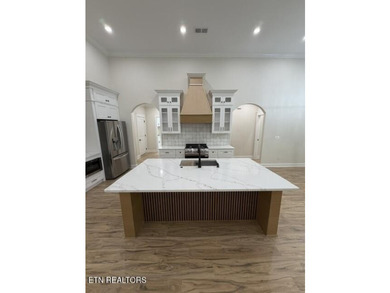 Welcome to this stunning custom-built home where timeless stone - photo 8