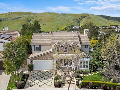 Perched atop a premium 9,000+ sq. ft. west-facing view lot in - photo 1