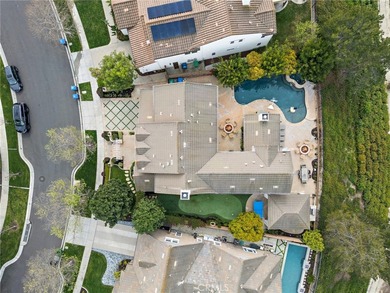 Perched atop a premium 9,000+ sq. ft. west-facing view lot in - photo 3