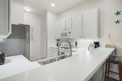 Welcome to your turnkey getaway at Bahama Bay Resort & Spa. This - photo 12