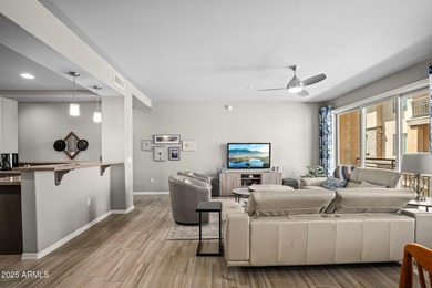 This highly upgraded North Scottsdale gated condominium offers