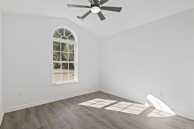 Price Improvement! Beautifully updated 3BR/2BA pond-front home - photo 15