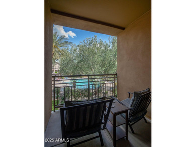This highly upgraded North Scottsdale gated condominium offers