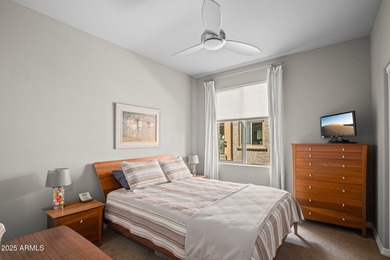 This highly upgraded North Scottsdale gated condominium offers