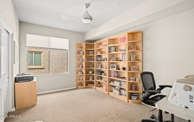 This highly upgraded North Scottsdale gated condominium offers