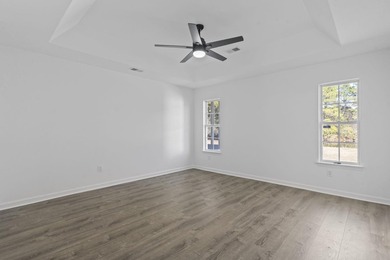 Price Improvement! Beautifully updated 3BR/2BA pond-front home - photo 20