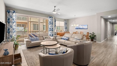 This highly upgraded North Scottsdale gated condominium offers