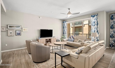 This highly upgraded North Scottsdale gated condominium offers