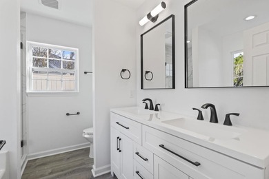 Price Improvement! Beautifully updated 3BR/2BA pond-front home - photo 22