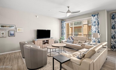 This highly upgraded North Scottsdale gated condominium offers