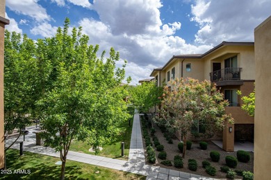 This highly upgraded North Scottsdale gated condominium offers