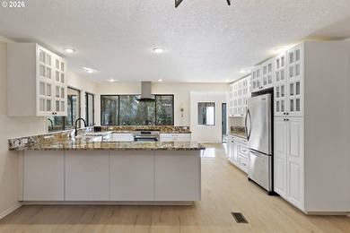 Tucked away on nearly 7 acres of serene, forested privacy, this - photo 10